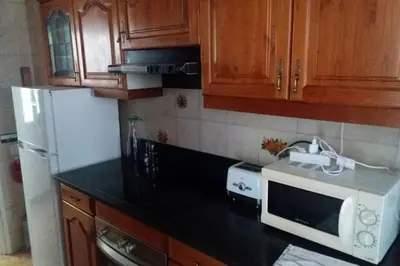 Una cocina o zona de cocina en Apartament Mar Brava a 3 min a peu de la platja