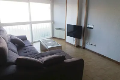 Una televisión o centro de entretenimiento en Apartament Mar Brava a 3 min a peu de la platja