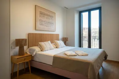Cama o camas de una habitación en Modern Central Apartment Building