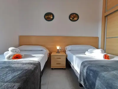 Cama o camas de una habitación en VILLAS COSETTE - Apartamento Mar Bella 17