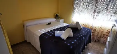 Cama o camas de una habitación en VILLAS COSETTE Apartamento RANCHO SUIZO 8 1 1