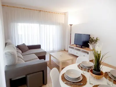 Una televisión o centro de entretenimiento en VILLAS COSETTE - Apartamento Santamaria