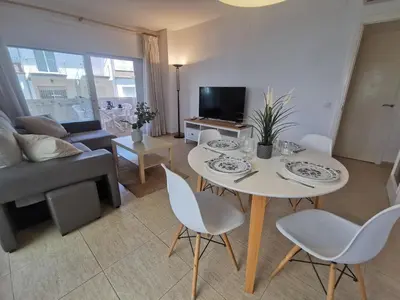 Una televisión o centro de entretenimiento en VILLAS COSETTE - Apartamento Santamaria