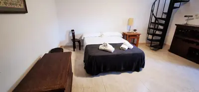 Cama o camas de una habitación en VILLAS COSETTE - Villa Martina
