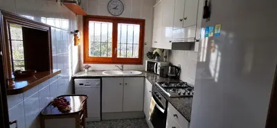 Una cocina o zona de cocina en VILLAS COSETTE - Villa Martina