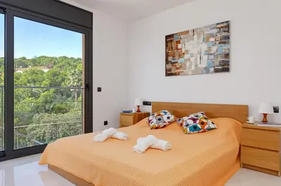 Cama o camas de una habitación en Naranja