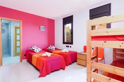 Cama o camas de una habitación en Naranja
