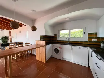 Una cocina o zona de cocina en Private Apartments Cala Canyelles