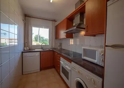 Una cocina o zona de cocina en Village Golf Beach