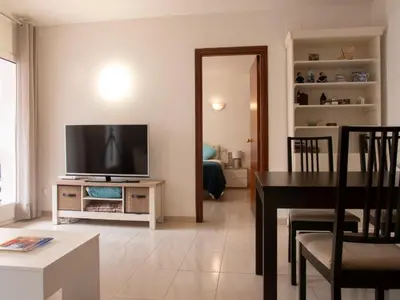 Una televisión o centro de entretenimiento en Còmode apartament al bell mig de Girona
