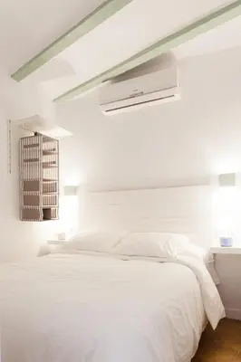 Cama o camas de una habitación en L'Havanera Boutique Home
