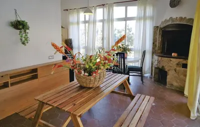Una televisión o centro de entretenimiento en Villa Suria 8 people Lloret de mar