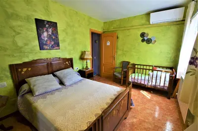 Cama o camas de una habitación en Villa Olombel