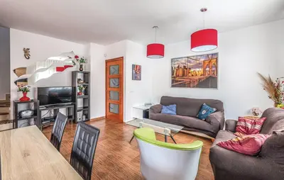 Una televisión o centro de entretenimiento en Villa Caravan 6 people 7 kms Lloret de mar