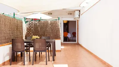Zona de estar de Patio Budget Apartment 12