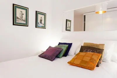 Cama o camas de una habitación en Patio Budget Apartment 12