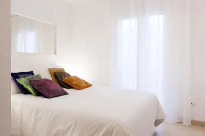 Cama o camas de una habitación en Patio Budget Apartment 12