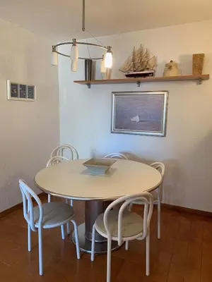 Una televisión o centro de entretenimiento en Apartamento en Torre Valentina, la mejor playa!