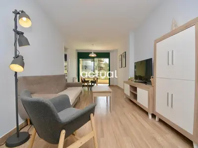 Una televisión o centro de entretenimiento en Super Beach 10H