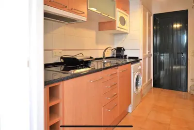 Una cocina o zona de cocina en Espectacular apartamento con piscina en Calella de Palafrugell