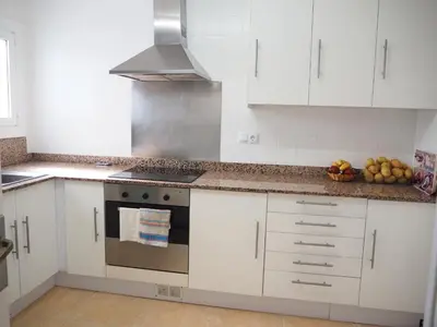 Una cocina o zona de cocina en Pis gran i reformat per 4 persones