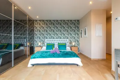 Cama o camas de una habitación en Villa Origami