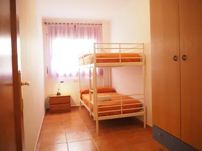 Cama o camas de una habitación en NINFA Apartamento con balcón ideal familias con vistas al mar