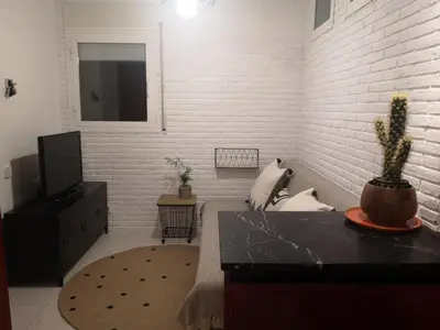 Una televisión o centro de entretenimiento en Torre con vistas