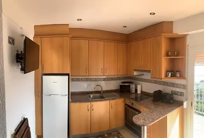 Una cocina o zona de cocina en Apartamento primera línea de Mar Enjoy the view