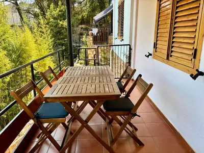 Un balcón o terraza de Quiet apartment Cala Canyellas