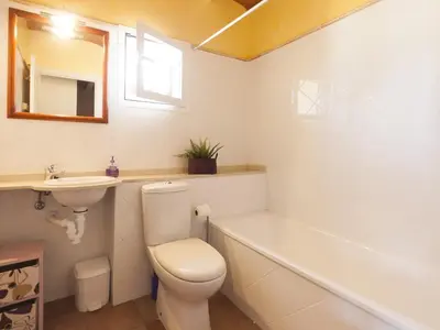 Un baño de Lets Holidays LUXURY HOUSE in CALA LLEVADO 3