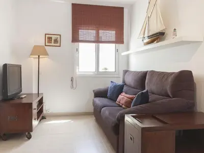 Una televisión o centro de entretenimiento en Lets Holidays Centric apartment with parking