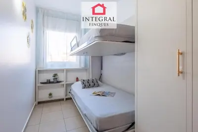Cama o camas de una habitación en Palamós BeachFront Apartment