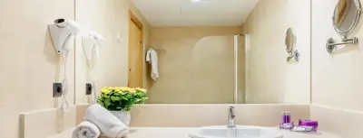 Un baño de Apartamentos Beverly
