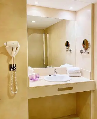 Un baño de Apartamentos Beverly