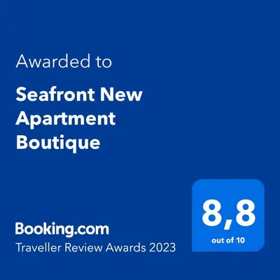 Certificado, premio, señal o documento que está expuesto en Seafront New Apartment Boutique