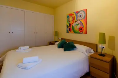 Cama o camas de una habitación en Devesa Park Apartment with Private Parking