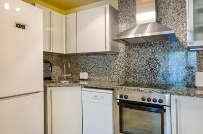 Una cocina o zona de cocina en Devesa Park Apartment with Private Parking