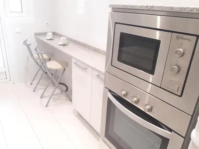 Una cocina o zona de cocina en Suitur apartamento primera linea mar vistas playa