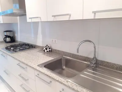 Una cocina o zona de cocina en Suitur apartamento primera linea mar vistas playa