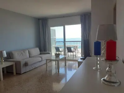 Zona de estar de Suitur apartamento primera linea mar vistas playa