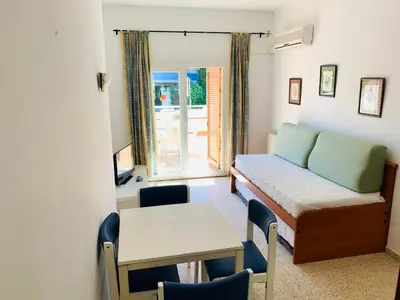 Cama o camas de una habitación en Eva Aparthotel