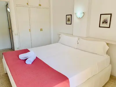 Cama o camas de una habitación en Eva Aparthotel