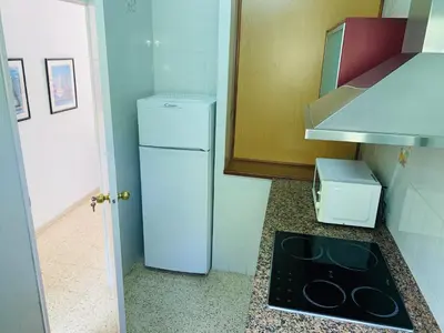 Una cocina o zona de cocina en Eva Aparthotel