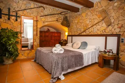 Cama o camas de una habitación en CAN BERNARDI