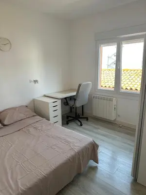 Cama o camas de una habitación en White Apartment