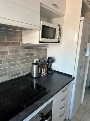 Una cocina o zona de cocina en White Apartment