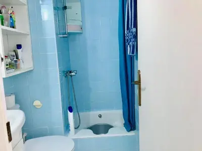 Un baño de Investingspain Studio beach paradise front sea views on the beach