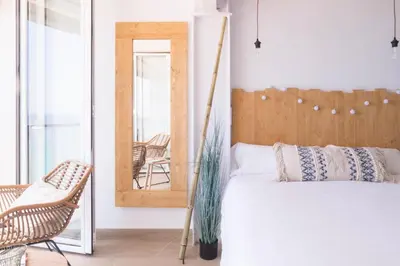 Cama o camas de una habitación en Vanilla Beach Boutique Studio