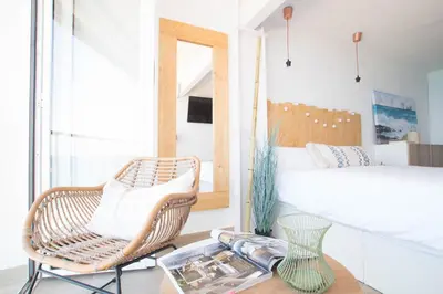 Cama o camas de una habitación en Vanilla Beach Boutique Studio